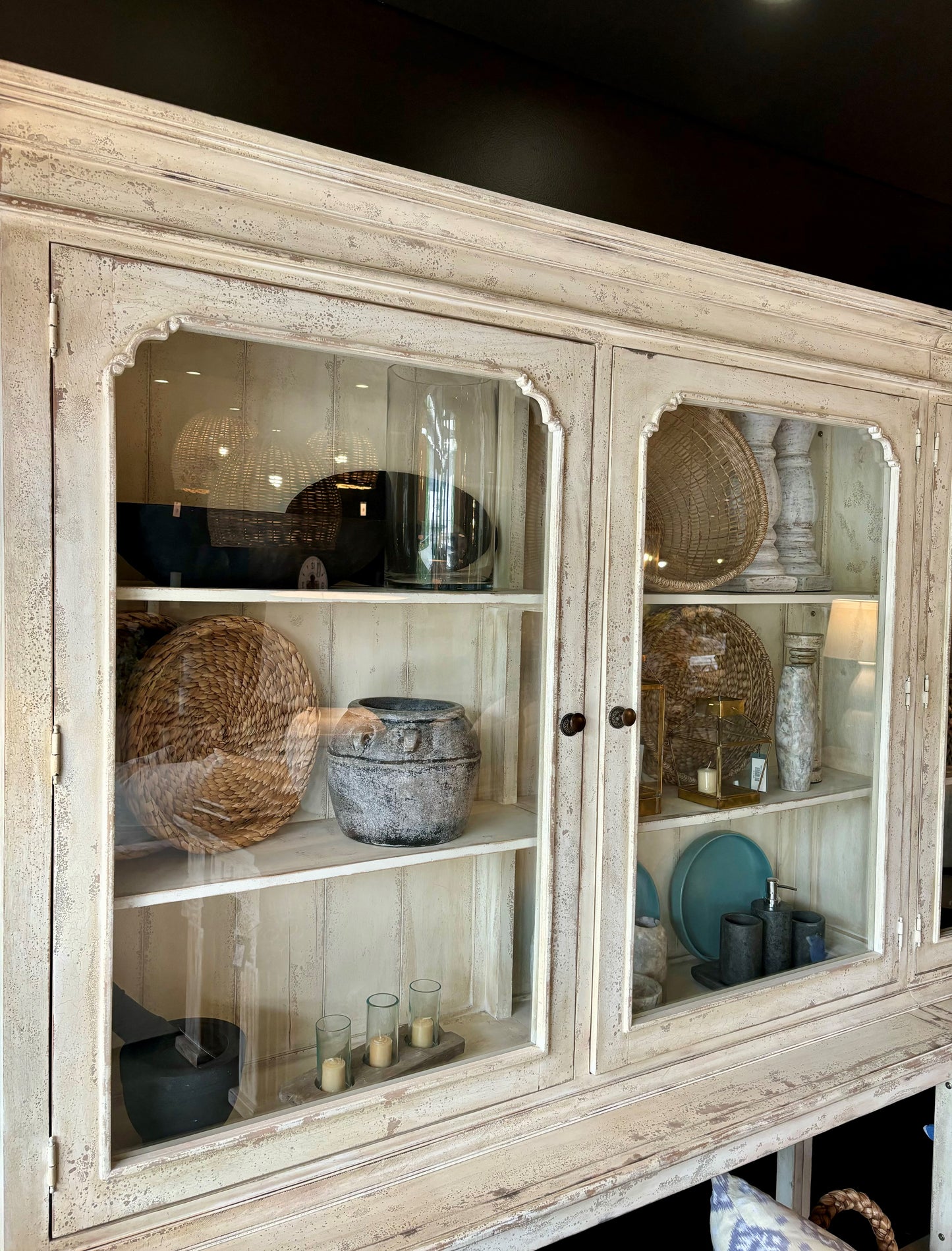 Grand and elegant in both scale and beauty, this exceptional tribute to a French Cabinet is hand made from solid mahogany and showcases an antiqued finish. Detail