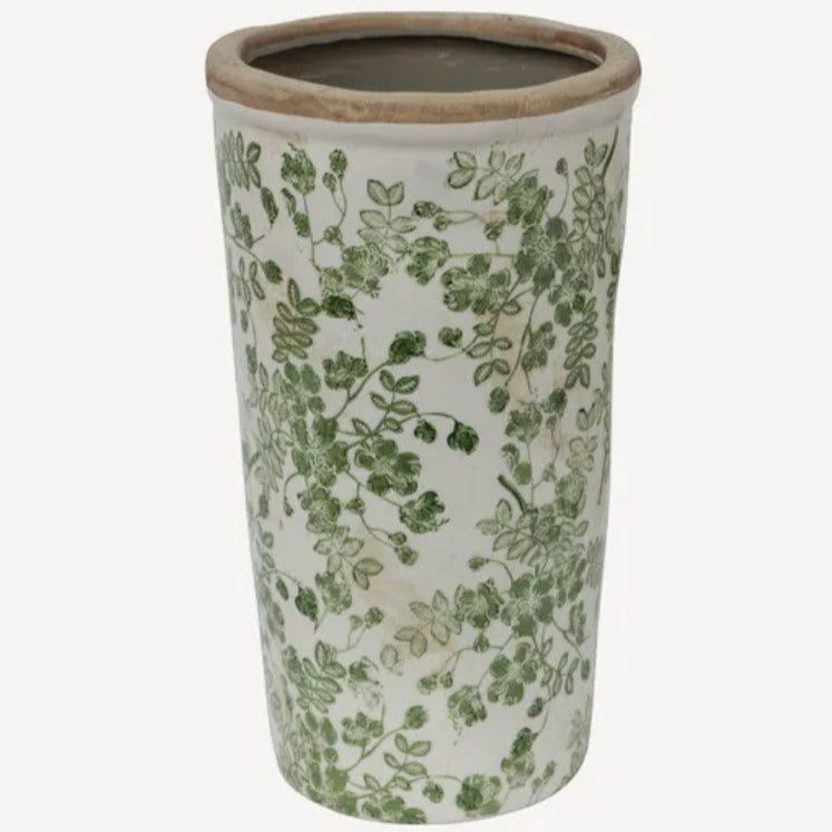 Embrace the rejuvenating essence of nature with the Green Botanical Print Vase. Exquisitely made from stoneware and embellished with a hand-stamped botanical pattern, this adaptable piece infuses a sense of organic charm into any indoor or outdoor area. front