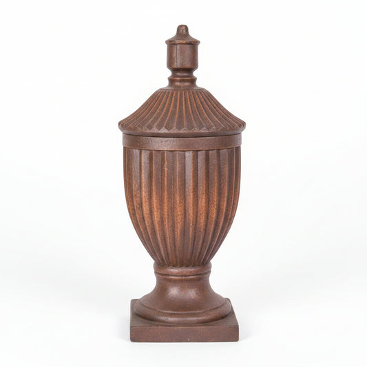 Decorative urn with a lid on a white background