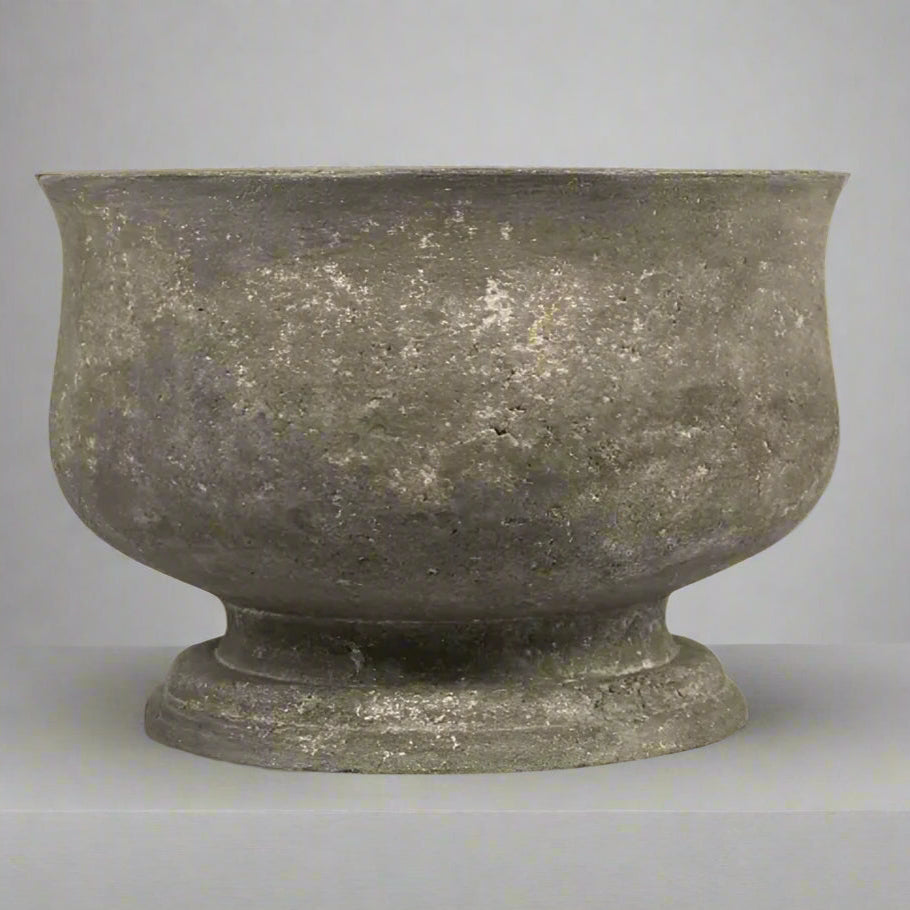 The Odette Grey Pot is thoughtfully crafted to showcase your orchids in a stunning grey aesthetic. Its low profile and skillful artistry add a timeless sophistication and organic feel to any space. Constructed from resilient stonecast material, it is lightweight and versatile for both indoor and outdoor use, ensuring enduring beauty for years to come.