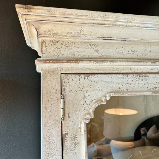 Grand and elegant in both scale and beauty, this exceptional tribute to a French Cabinet is hand made from solid mahogany and showcases an antiqued finish. Corner