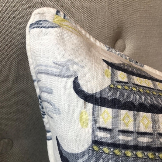 The Imperial Garden Linen Cushion features timeless designs born from 17th century European artisans to reflect romanticized, theatrical, and playful interpretations of life in the Far East. Its elements, such as exotic animals, pagodas, and imaginative Asian imagery, render it perfectly suitable for any interior décor. Corner close up.