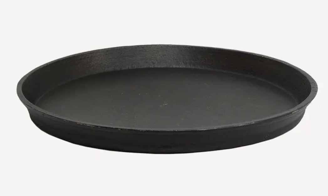 Add a touch of vintage charm to your home decor with the Kara Bronze Round Tray. Its stunning bronze finish and angled lifted edges make it the perfect addition to coffee tables, consoles, or even ottomans. This practical yet elegant accessory will enhance any decorative vignette.