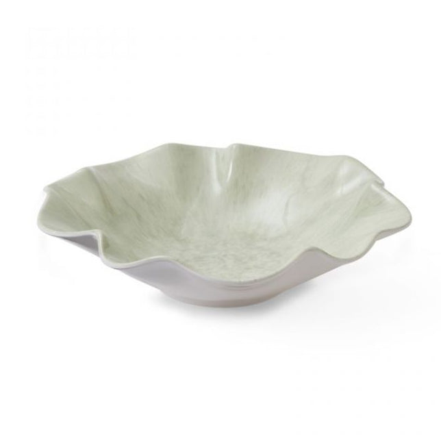 Green melamine bowl with wavy edge on a white background