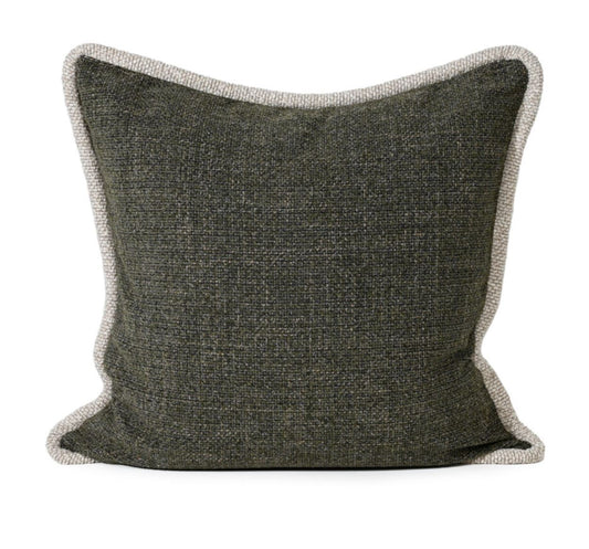 Olive green cushion with textured trim on a white background