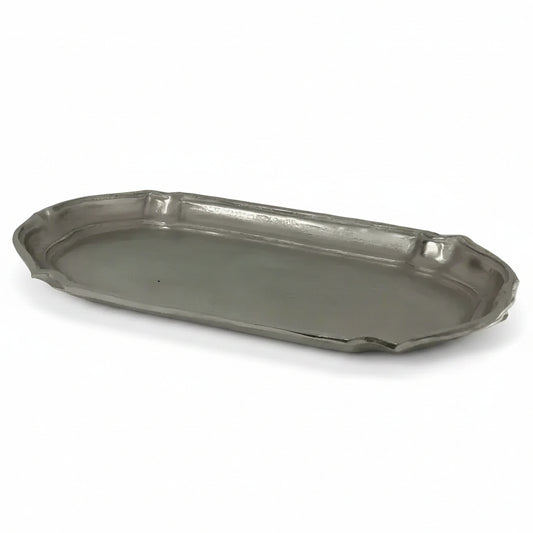 Add a touch of sophistication to your home with the Baroque Tray Large, ideal for showcasing on a coffee table, console, or sideboard. Featuring a captivating baroque-inspired design, this aluminium tray is finished in an elegant aged silver, combining style and practicality effortlessly.