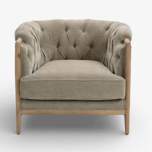 Beige armchair with wooden frame on a white background