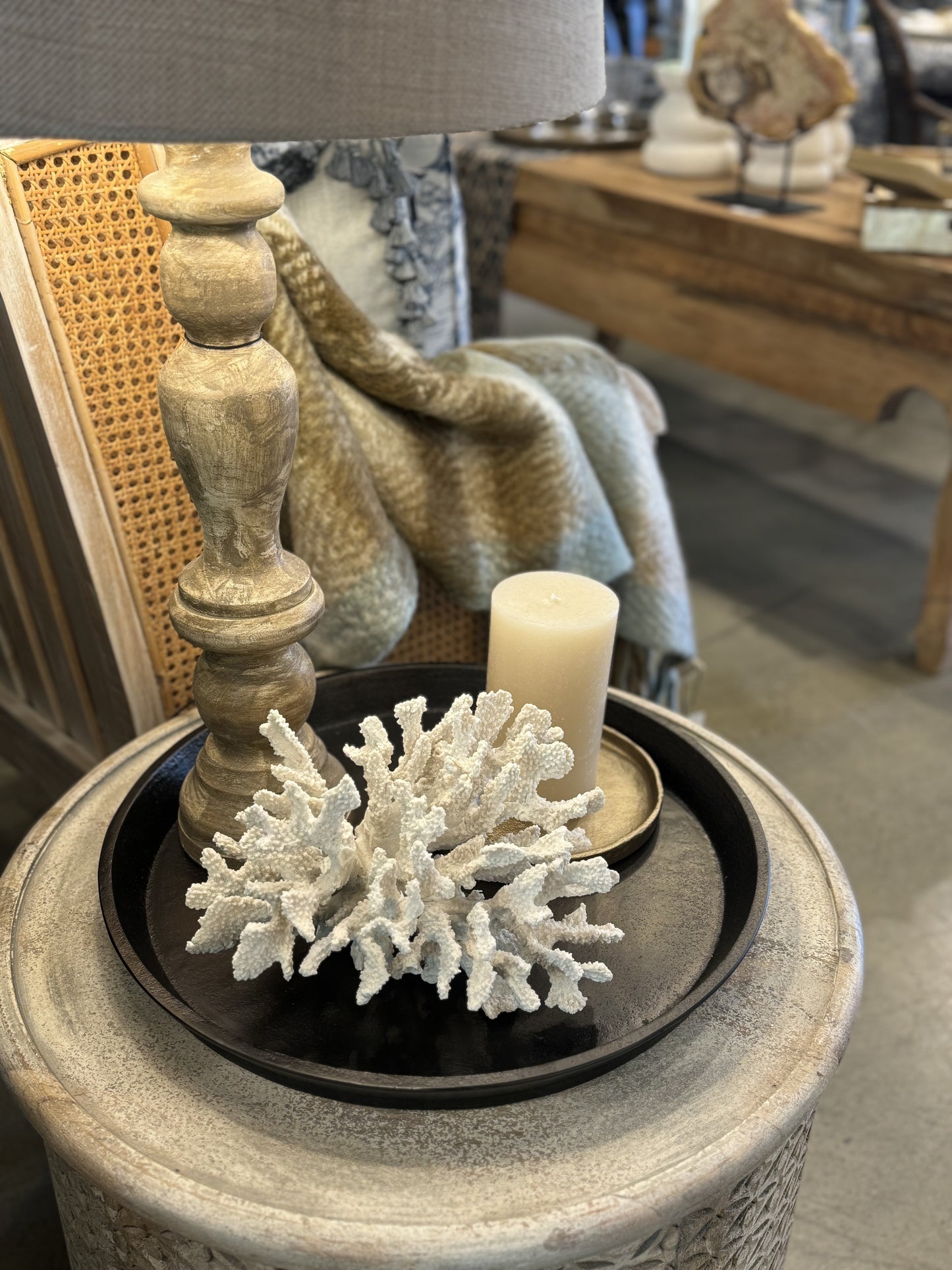 This White Reef Coral sculpture is the perfect way to bring a touch of the ocean into your home. Its intricate texture and complex design will give any setting an elegant, resort-like feel. Crafted from chemical-resistant polyresin, it's a durable piece that will keep its beauty for years. Add a chic, organic accent to your decor without harming the environment. Styled top.