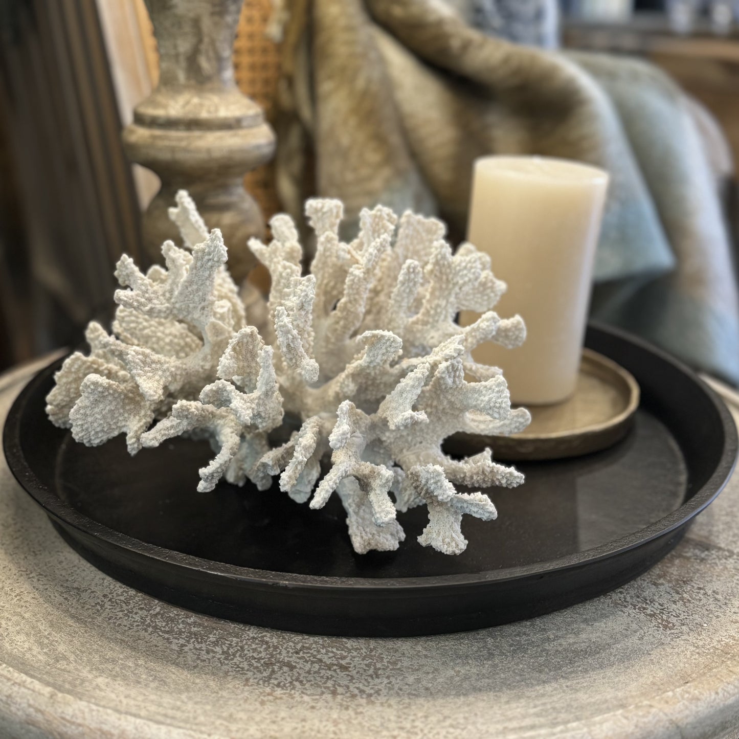 This White Reef Coral sculpture is the perfect way to bring a touch of the ocean into your home. Its intricate texture and complex design will give any setting an elegant, resort-like feel. Crafted from chemical-resistant polyresin, it's a durable piece that will keep its beauty for years. Add a chic, organic accent to your decor without harming the environment. Styled.