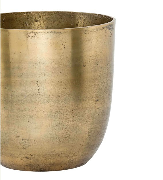 This sophisticated Versailles Gold Ice Bucket is ideal for hosting gatherings and keeping beverages chilled. It also functions well as a planter or vase, boasting an elegant aged gold hue. Close up.