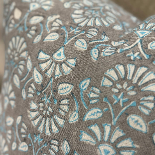 Crafted from heavyweight French linen, this cushion features a charming hand block-printed design with natural texture on oatmeal flax. 55cm x 55cm .