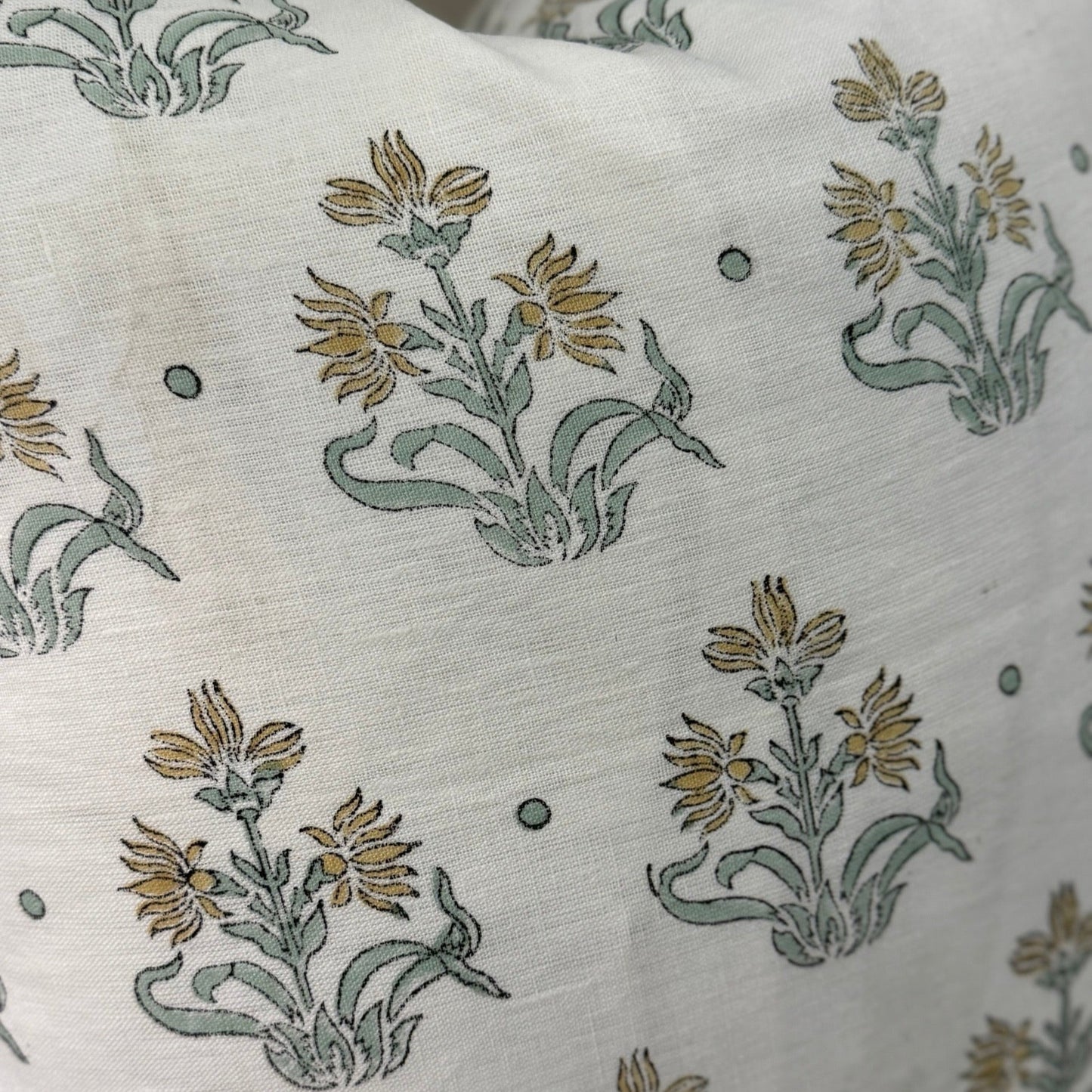 Elevate your home decor with the Imperial Bloom Block Printed Linen Cushion, seamlessly combining the age-old technique of block printing with luxurious 100% organic linen. Featuring a captivating floral pattern on a off white background, this cushion includes a hypoallergenic micro-fibre cotton insert for unparalleled comfort.
Block printing on fabric is a traditional, handcrafted process that naturally results in slight inconsistencies. These variations are not flaws but rather a hallmark of the techniqu