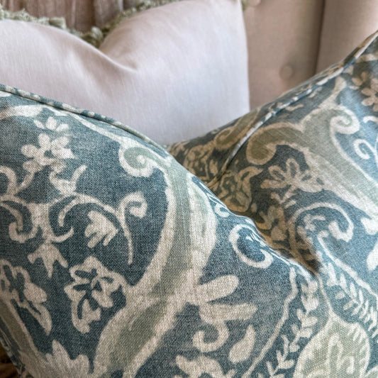 The Florentine Teal & Sage Cushion in sturdy linen blend with feather fill adds elegance, comfort & refined style to any sofa, chair, or bedroom.
