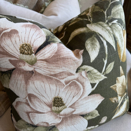 Floral-patterned cushions on a sofa