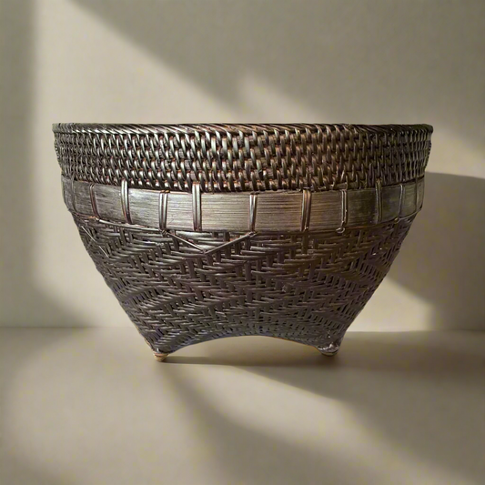 Crafted by East Indonesian Island Villagers, this stunning Sahara Handcrafted Bamboo & Rattan Basket is perfect as an accent piece or use to provide additional valuable storage. Front.