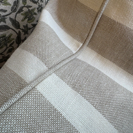 Close-up of a textured fabric with a checkered pattern