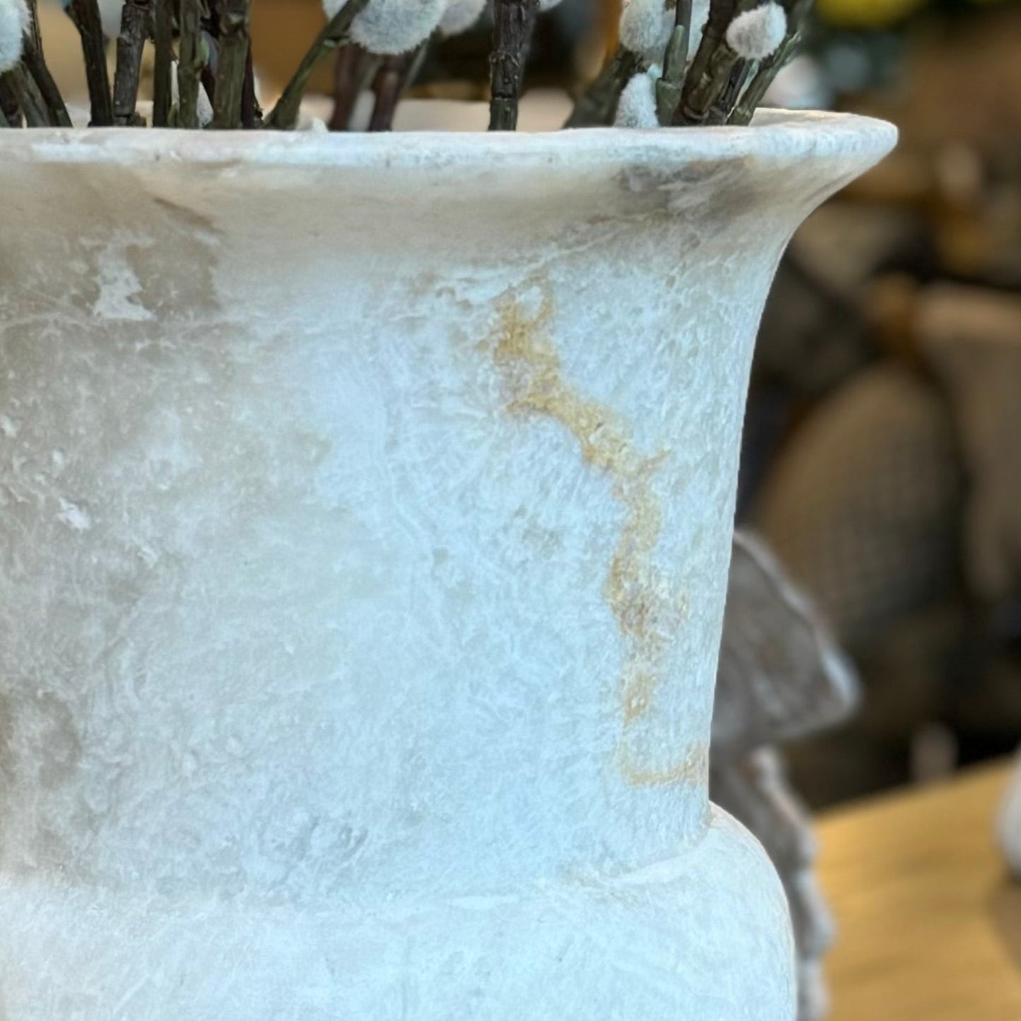 Experience the exquisite craftsmanship of our Chiskha Onyx Vase, hand-carved by skilled artisans in South East Asia. This stunning piece is made from a single block of quarried onyx, showcasing its natural beauty and unique colour veins. Make a statement with this gallery-quality vase, whether you display it as is or add your own touch with vibrant florals.