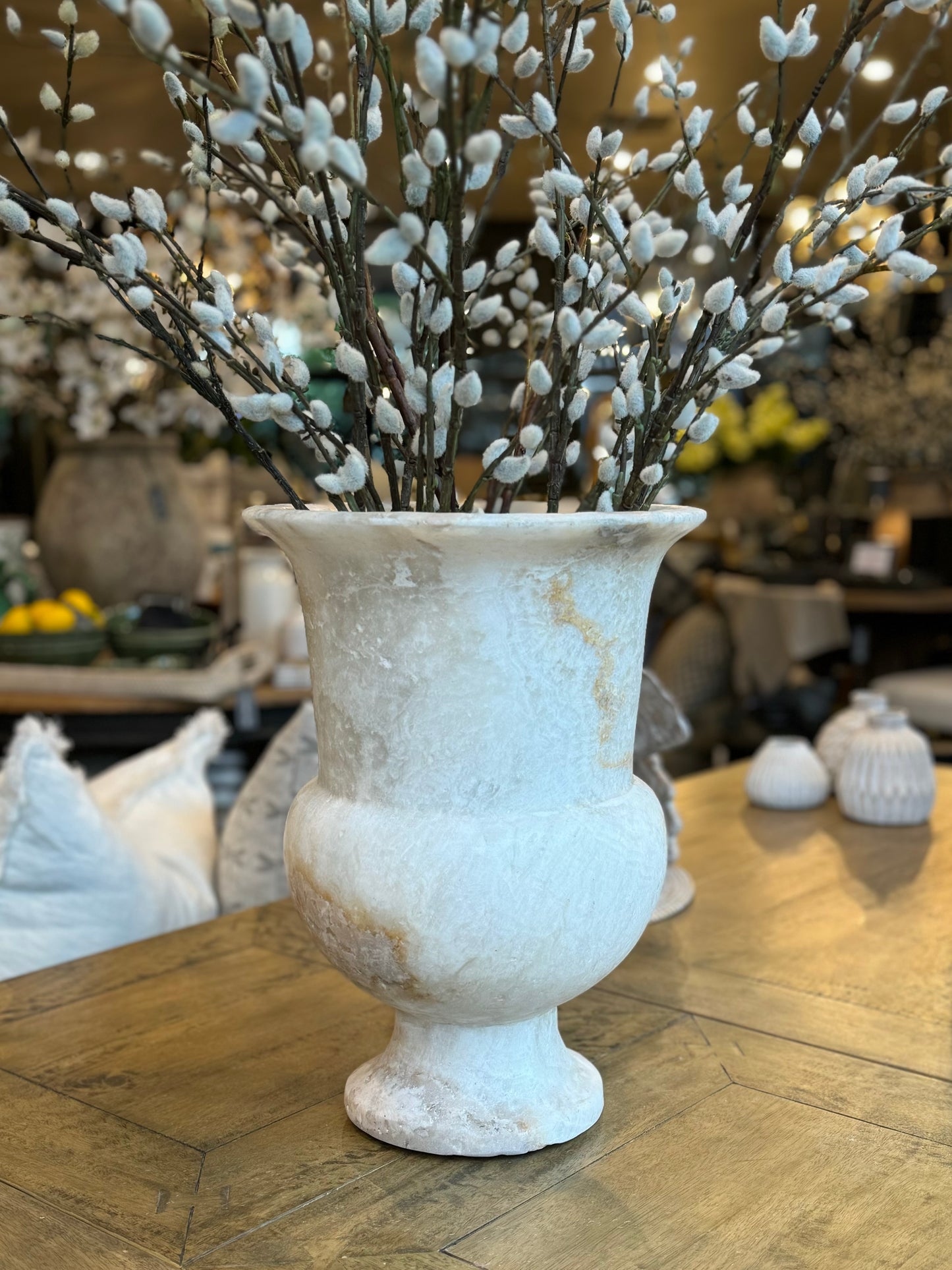 Experience the exquisite craftsmanship of our Chiskha Onyx Vase, hand-carved by skilled artisans in South East Asia. This stunning piece is made from a single block of quarried onyx, showcasing its natural beauty and unique colour veins. Make a statement with this gallery-quality vase, whether you display it as is or add your own touch with vibrant florals.