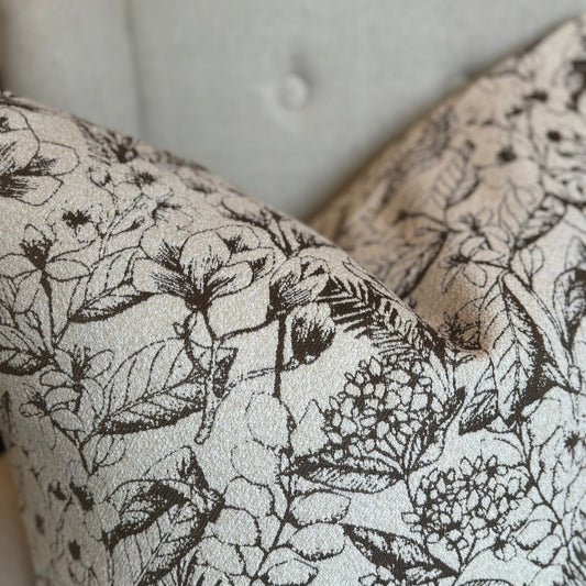 Transform your home into a cozy oasis with the Brown & Cream Linen Tassel Cushion. Its warm tones add a touch of elegance and comfort to any home décor this season, making it the perfect addition to your living space. Styled.