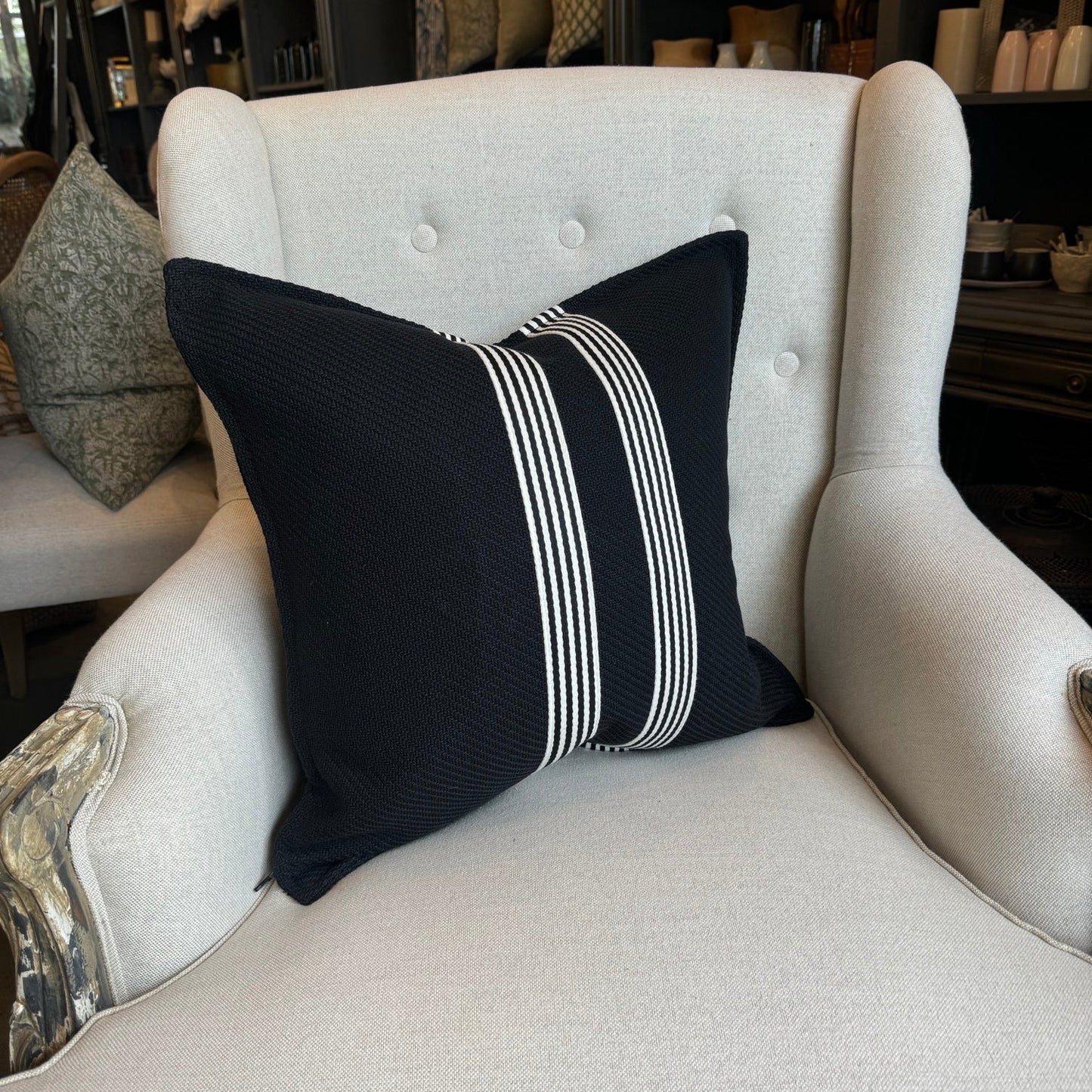 Channeling the sleek elegance of Milano's fashion district, each Black & White Herringbone Striped Cushion features the striking contrast of black and white, evoking the timeless beauty of the marble found in both ancient Italian villas and modern Milanese ateliers. Styled.