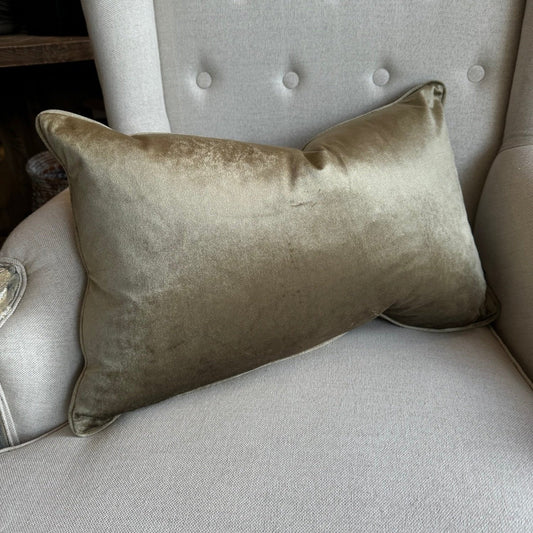 The Gold Velvet Lumbar Cushion offers a touch of luxury to any room. Its feather inserts provide unparalleled comfort, while its durability and ease of cleaning make it a practical choice. Mix and match with other cushions for a bold, dimensional look.
