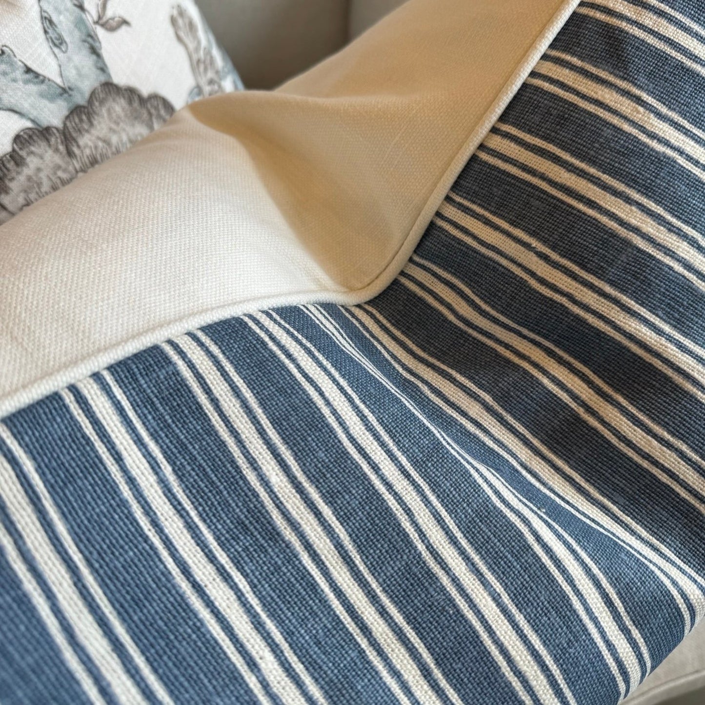 Embrace elegance with the timeless heavyweight design of the Capri Blue & Ivory Stripe Cushion. Its sophisticated pattern and luxurious feather insert will inspire a sense of refinement and comfort in any space. The combination of off-white and blue tones adds a touch of sophistication to your decor.