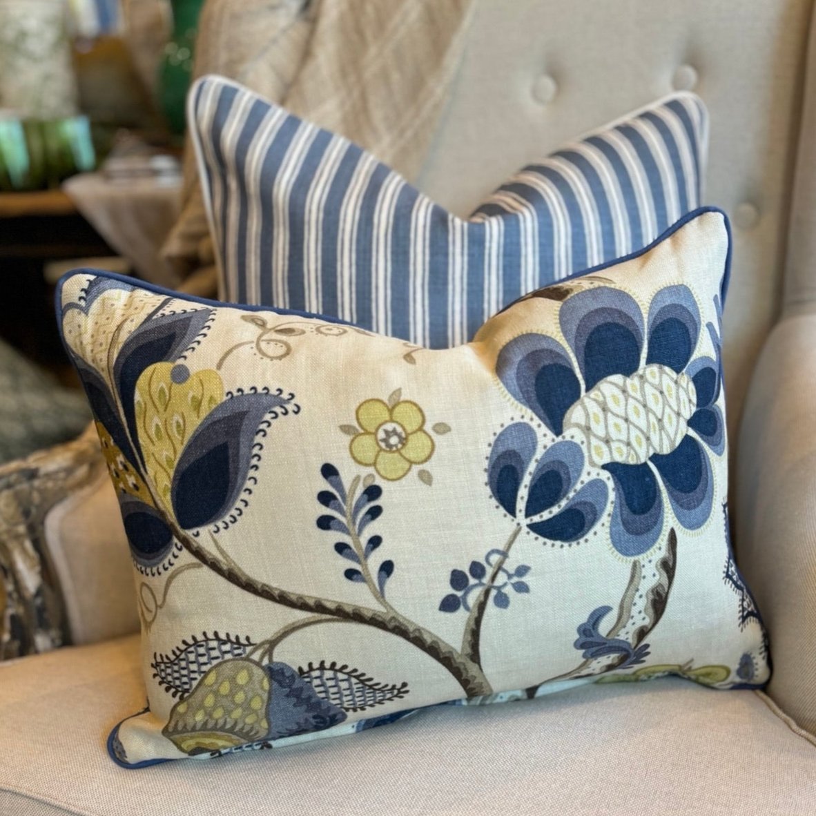 Indulge in the exquisite texture of the meticulously made Sophia Floral Heavyweight Cushion. This cushion boasts a stunning blue and green floral pattern on a neutral backdrop, and includes a plush feather insert for unparalleled coziness. The back is enhanced with oatmeal linen for a sophisticated touch.