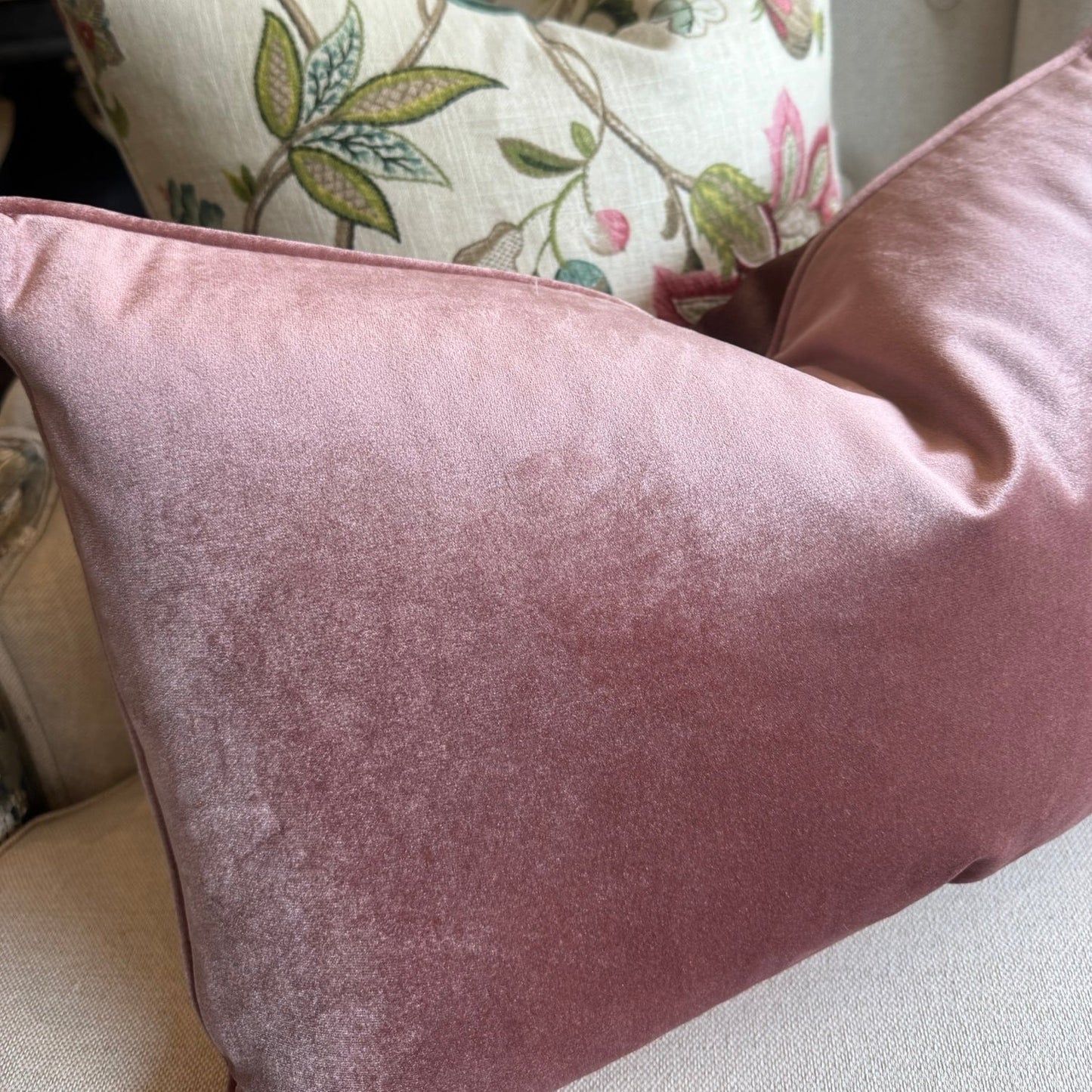 Indulge in the lavish comfort of our Dusty Pink Velvet Lumbar Cushion. Elevate any space with this cushion, adding sophistication and charm. Ideal for creating a plush and stylish feel when paired with other cushions on your couch or bed. Filled with fluffy feather inserts for unparalleled coziness, and easily machine washable with a gentle cycle.