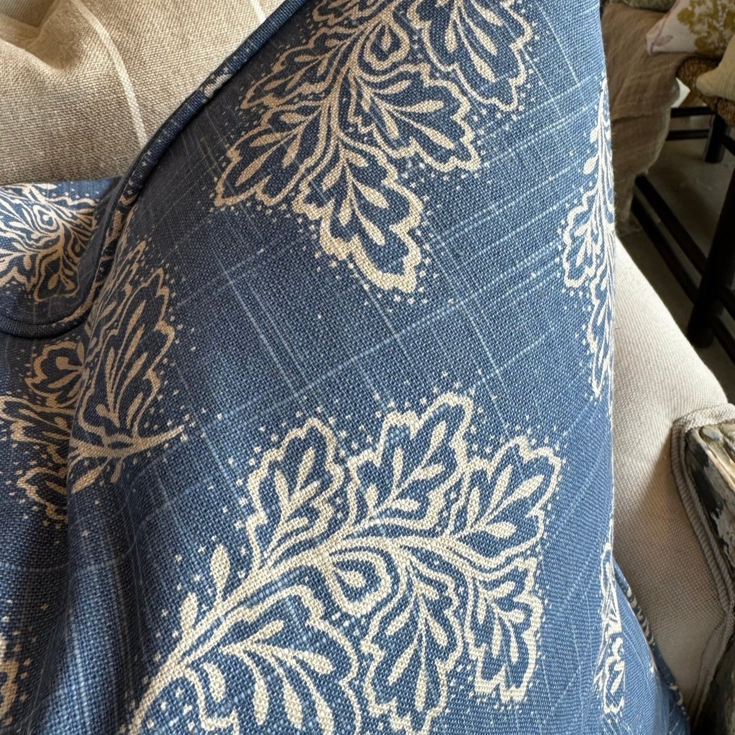 Add a touch of charm to your space with the Emmeline Blue Textured Linen Patterned Cushion. This versatile cushion can elevate the style of a casual tv room or add flair to a formal living room or bedroom. And with its feather insert, you can be sure to relax in ultimate comfort.