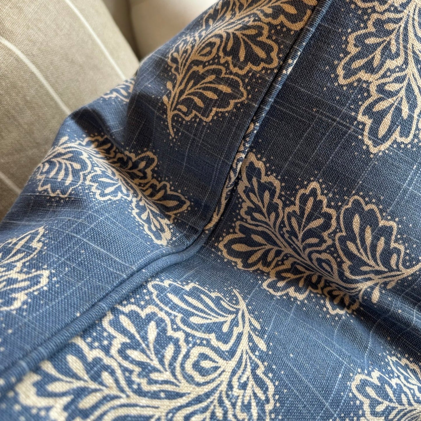 Add a touch of charm to your space with the Emmeline Blue Textured Linen Patterned Cushion. This versatile cushion can elevate the style of a casual tv room or add flair to a formal living room or bedroom. And with its feather insert, you can be sure to relax in ultimate comfort.