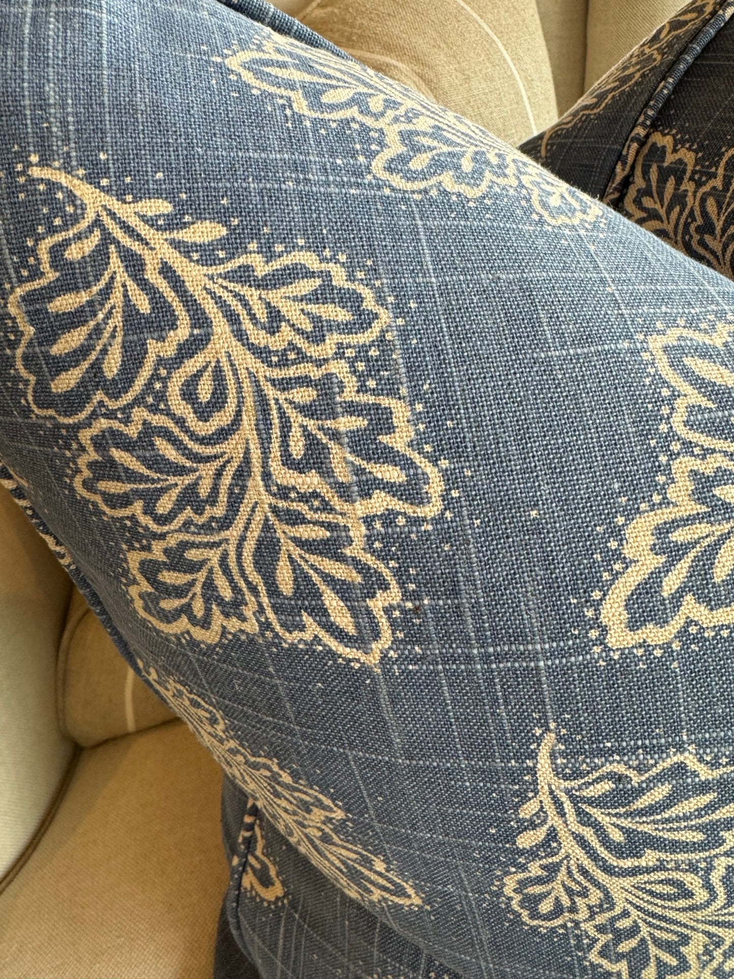 Add a touch of charm to your space with the Emmeline Blue Textured Linen Patterned Cushion. This versatile cushion can elevate the style of a casual tv room or add flair to a formal living room or bedroom. And with its feather insert, you can be sure to relax in ultimate comfort.