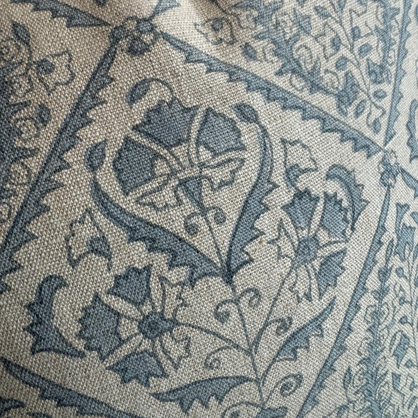 Experience the beauty and quality of CHAMOIS' Jaipur Dusty Blue Linen Cushion - a stunning addition to any interior. Meticulously crafted with a striking Indian block print pattern on premium 100% Belgian linen, this cushion exudes luxury and durability. Complete with a plush feather insert, elevate your home decor with this exquisite piece from CHAMOIS.