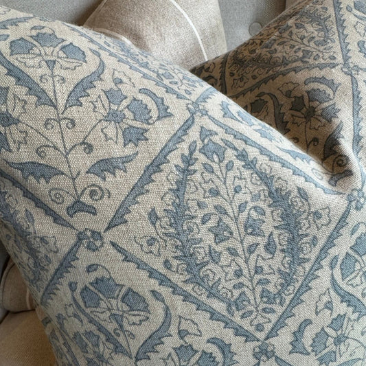 Experience the beauty and quality of CHAMOIS' Jaipur Dusty Blue Linen Cushion - a stunning addition to any interior. Meticulously crafted with a striking Indian block print pattern on premium 100% Belgian linen, this cushion exudes luxury and durability. Complete with a plush feather insert, elevate your home decor with this exquisite piece from CHAMOIS.