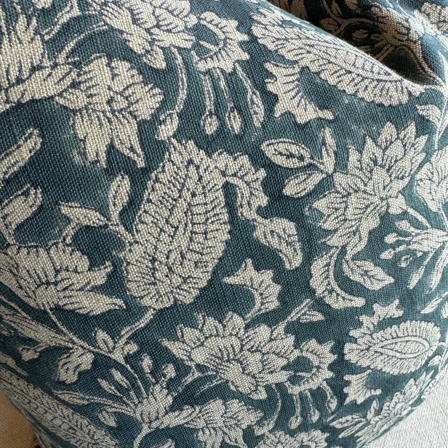 Experience the beauty and quality of CHAMOIS' Jodhpur Denim Blue Linen Cushion - a stunning addition to any interior. Meticulously crafted with a striking Indian block print pattern on premium 100% Belgian linen, this cushion exudes luxury and durability. Complete with a plush feather insert, elevate your home decor with this exquisite piece from CHAMOIS.