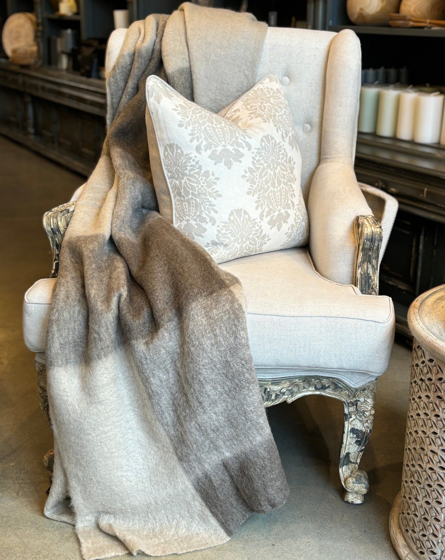 Experience the epitome of comfort and warmth with the luxurious Plaid Beige & Brown Throw. Featuring elegant tassels for added texture and sophistication, this throw adds personality to your bedding or sofa, perfectly complementing other textiles. The rich, inviting colours of grey and brown add depth and create a sense of cozy welcome in any space. front