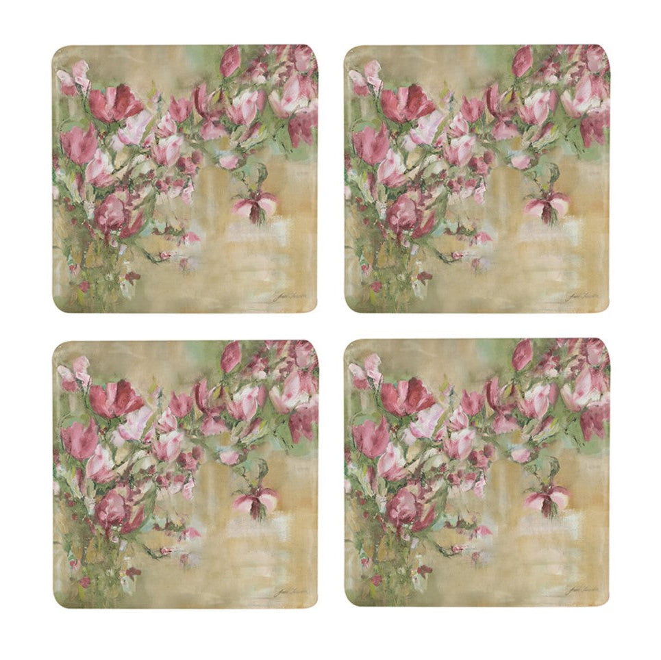 This elegant Magnolia Limone Pink Floral Coaster - Set Of 4 features vibrant pink magnolia blooms against a delicate and inviting backdrop. These coasters make a statement on any table surface while also helping protect furniture. Front