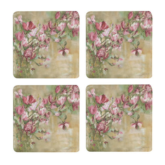 This elegant Magnolia Limone Pink Floral Coaster - Set Of 4 features vibrant pink magnolia blooms against a delicate and inviting backdrop. These coasters make a statement on any table surface while also helping protect furniture. Front