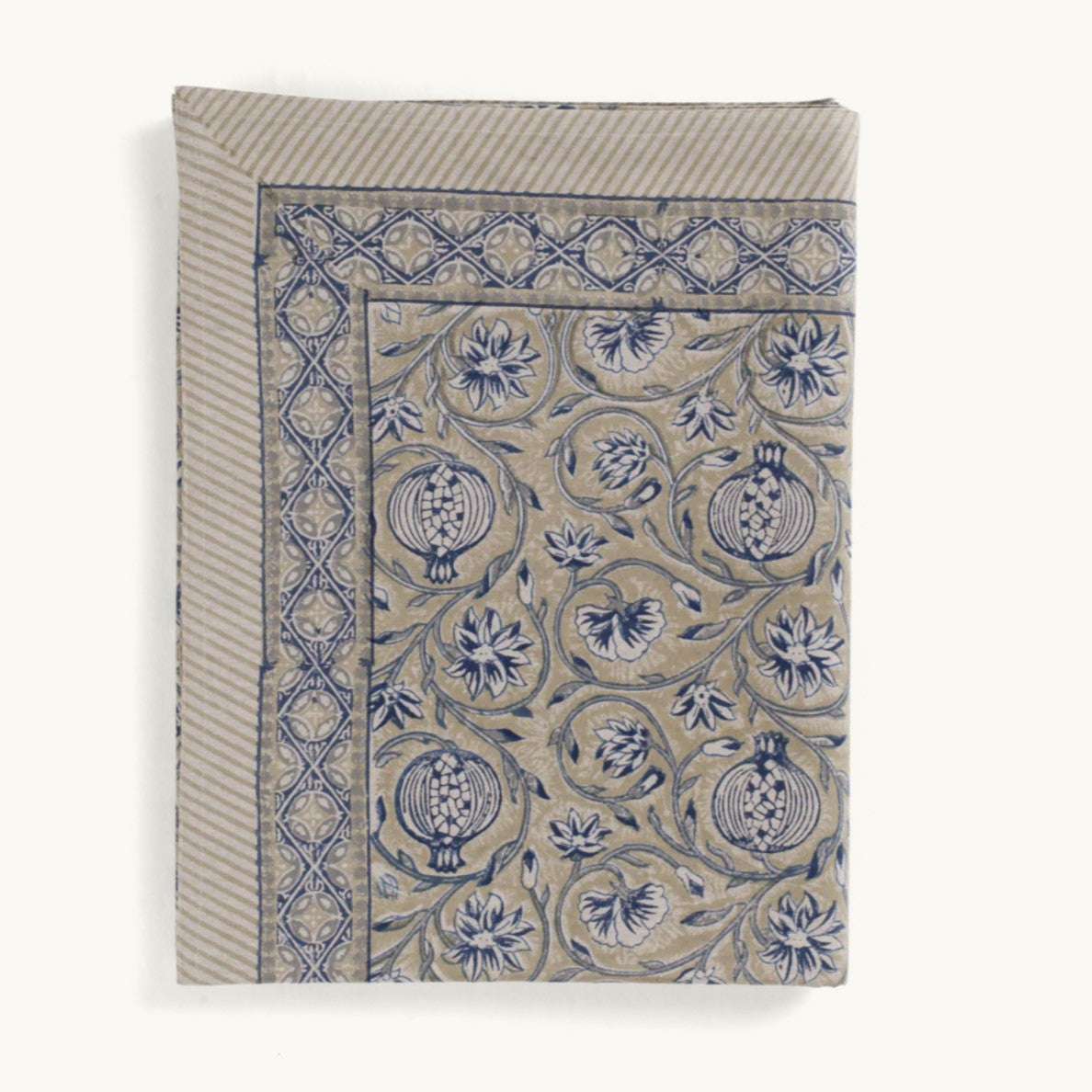 Revitalize your living space with the Cotton Tablecloth Tangier Pomegranate - Beige and Blue, brought to you by the esteemed Swedish brand CHAMOIS, known for their impeccable style and traditional values. This tablecloth effortlessly blends fresh sophistication, timeless design, and a distinct European feel, making it the perfect addition for creating unforgettable experiences with your loved ones. The breath taking Indian block print patterns and centuries-old handcrafted techniques infuse a special charm