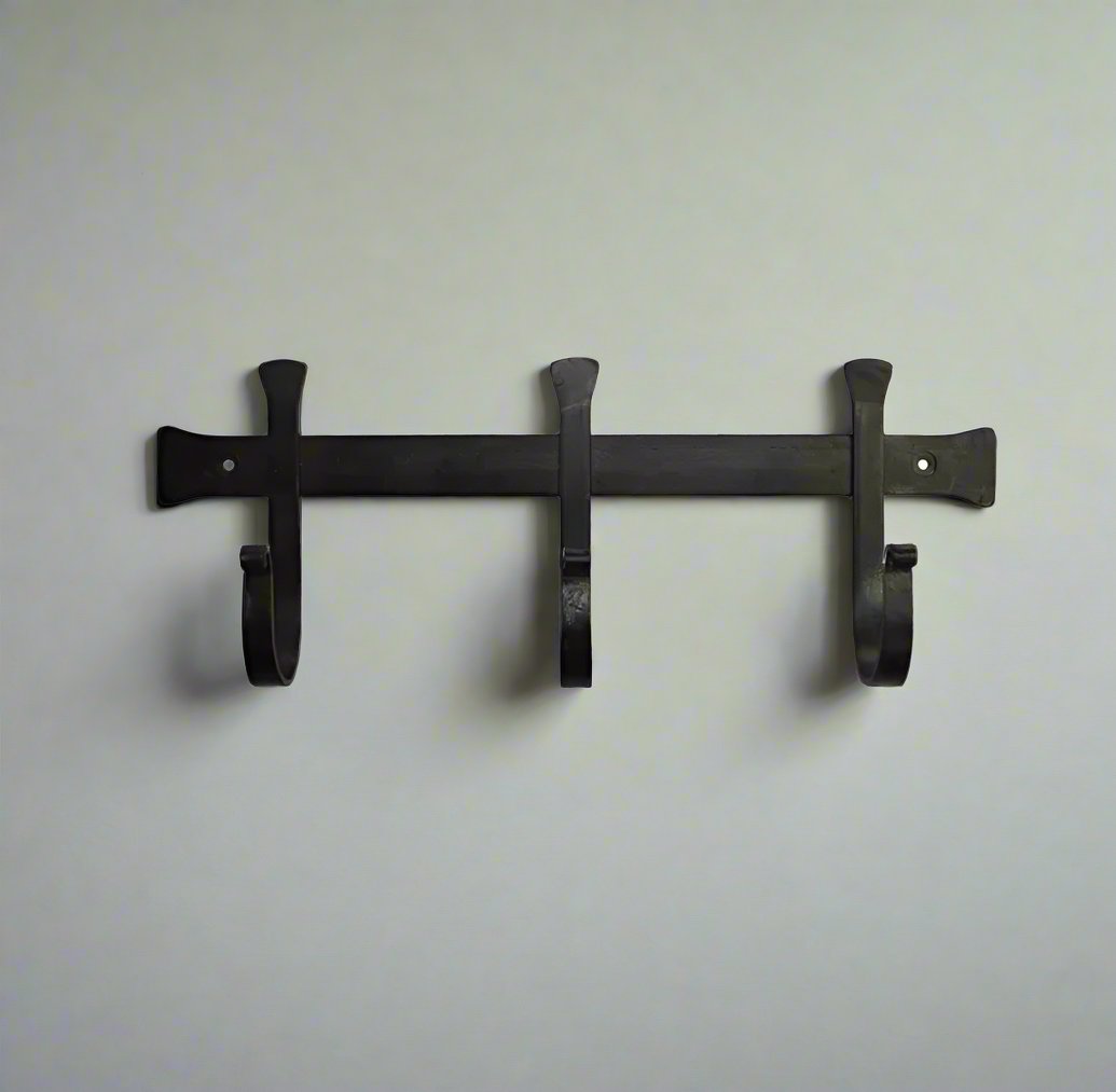 This charming & timeless wrought iron hook is perfect in anywhere in the house for additional hanging.