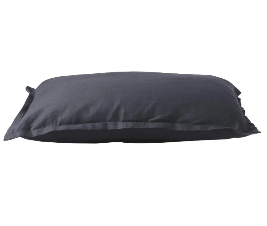 Indulge in the opulent grace and simplicity of Avignon's 100% Linen Standard Pillowcase. With its flange design and stylish dark grey hue, this pillowcase offers both comfort and aesthetic appeal. Crafted from pure linen, it is irresistibly soft to the touch and ideal for layering. Treat yourself to a superior sleep experience with the breathability and natural beauty of linen.