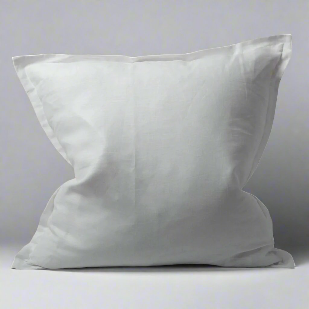 With its flange design and crisp white hue, this pillowcase offers both comfort and aesthetic appeal. Crafted from pure linen, it is irresistibly soft to the touch and ideal for layering. Treat yourself to a superior sleep experience with the breathability and natural beauty of linen. Plush feather insert included.