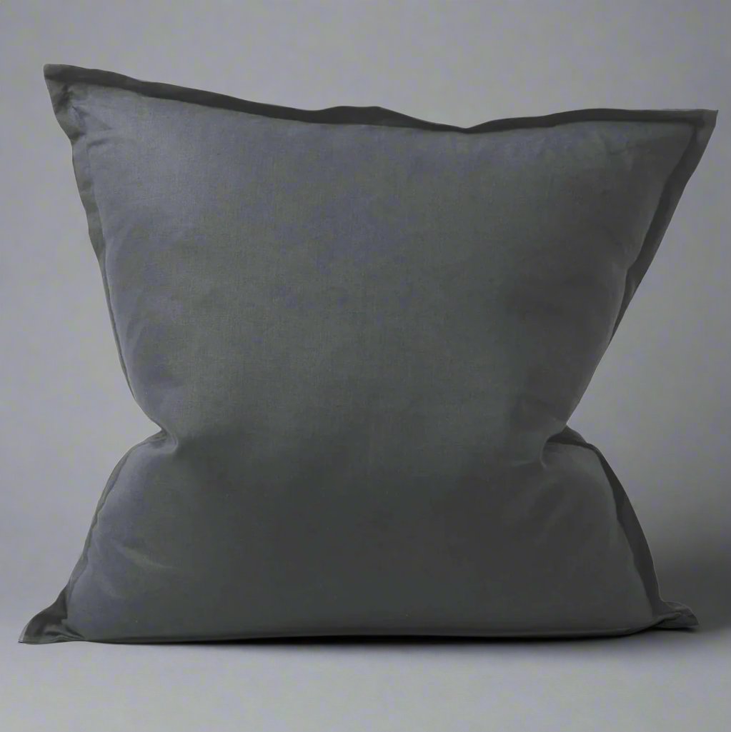 Indulge in the opulent grace and simplicity of Avignon's 100% Linen European Pillow. With its flange design and dark grey hue, this pillowcase offers both comfort and aesthetic appeal. Crafted from pure linen, it is irresistibly soft to the touch and ideal for layering. Treat yourself to a superior sleep experience with the breathability and natural beauty of linen.