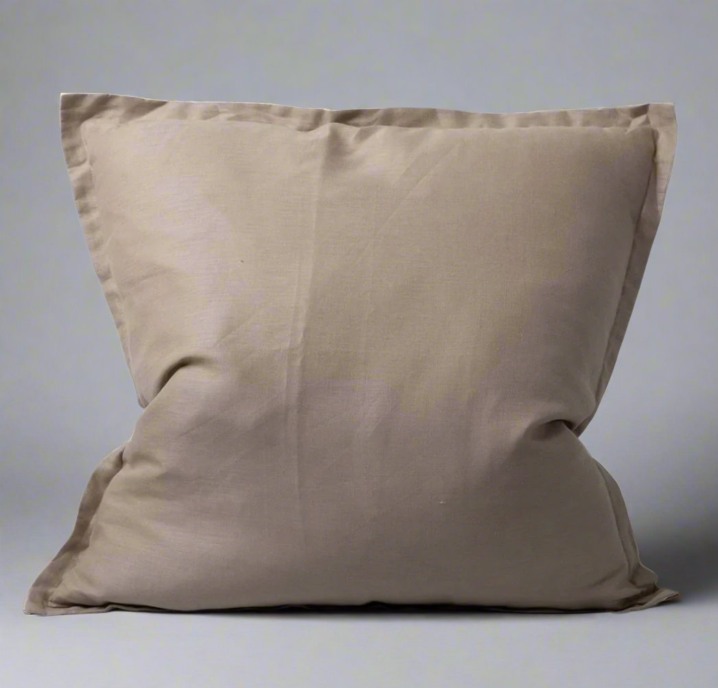 Indulge in the opulent grace and simplicity of Avignon's 100% Linen European Pillow. With its flange design and neutral stone hue, this pillowcase offers both comfort and aesthetic appeal. Crafted from pure linen, it is irresistibly soft to the touch and ideal for layering. Treat yourself to a superior sleep experience with the breathability and natural beauty of linen. Included is a plush feather insert.