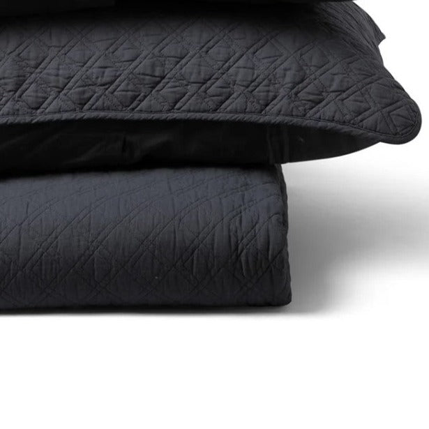 The Marseilles Double Diamond 100% cotton quilt exudes both comfort and style. Featuring an elegant dark grey hue and timeless pattern with intricate cross stitching, it's sure to add a touch of elegance to your bedroom. Crafted with soft and luxurious 100% cotton fabric and wadding, it's also conveniently machine washable on a delicate cycle. Pillowcases sold separately.