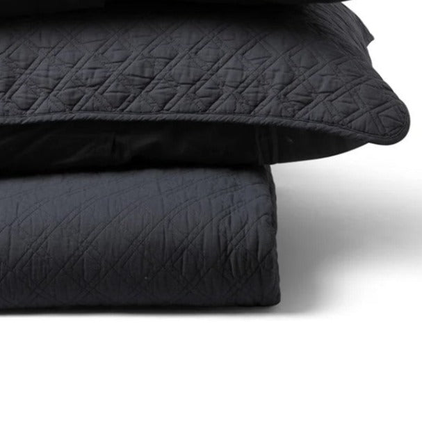 The Marseilles Double Diamond 100% cotton quilt exudes both comfort and style. Featuring an elegant dark grey hue and timeless pattern with intricate cross stitching, it's sure to add a touch of elegance to your bedroom. Crafted with soft and luxurious 100% cotton fabric and wadding, it's also conveniently machine washable on a delicate cycle. Pillowcases sold separately.