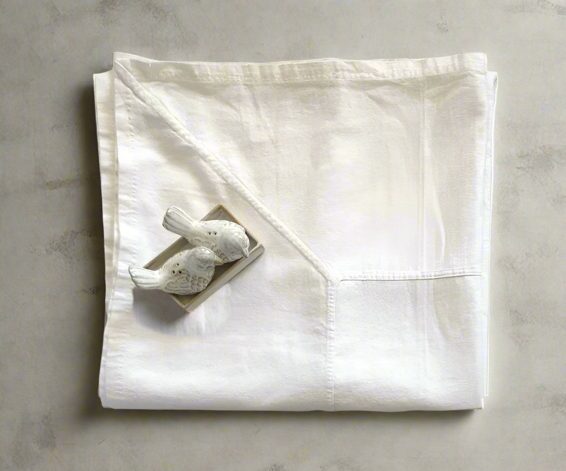 Effortlessly elegant, this timeless ivory tablecloth measures 180cm x 270cm and is suitable for both everyday use and special occasions. Crafted from a blend of linen and cotton, it offers the perfect combination of versatility and easy maintenance, making it a must-have for any table setting.
