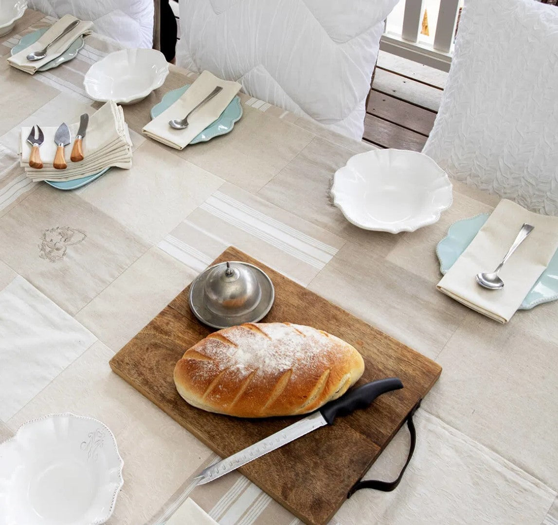 This timeless ivory tablecloth, measuring 180cm x 270cm, features elegant patterns in natural & ivory tones. Made from a blend of linen and cotton, it effortlessly combines versatility and easy maintenance for both everyday use and special occasions. A must-have for any table setting, this tablecloth offers the perfect combination of style and practicality.