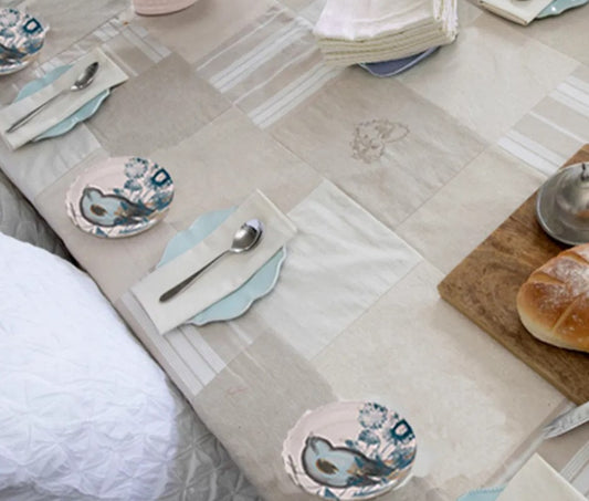 This timeless ivory tablecloth, measuring 180cm x 270cm, features elegant patterns in natural & ivory tones. Made from a blend of linen and cotton, it effortlessly combines versatility and easy maintenance for both everyday use and special occasions. A must-have for any table setting, this tablecloth offers the perfect combination of style and practicality.