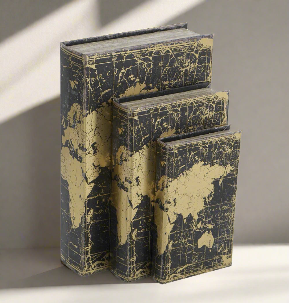 Add a luxurious touch to your home decor with our Set of 3 World Map Faux Books. These traditional-inspired pieces elevate any room with their elegance. Spruce up your bookshelf, living room, or entryway with these stylish and practical additions.