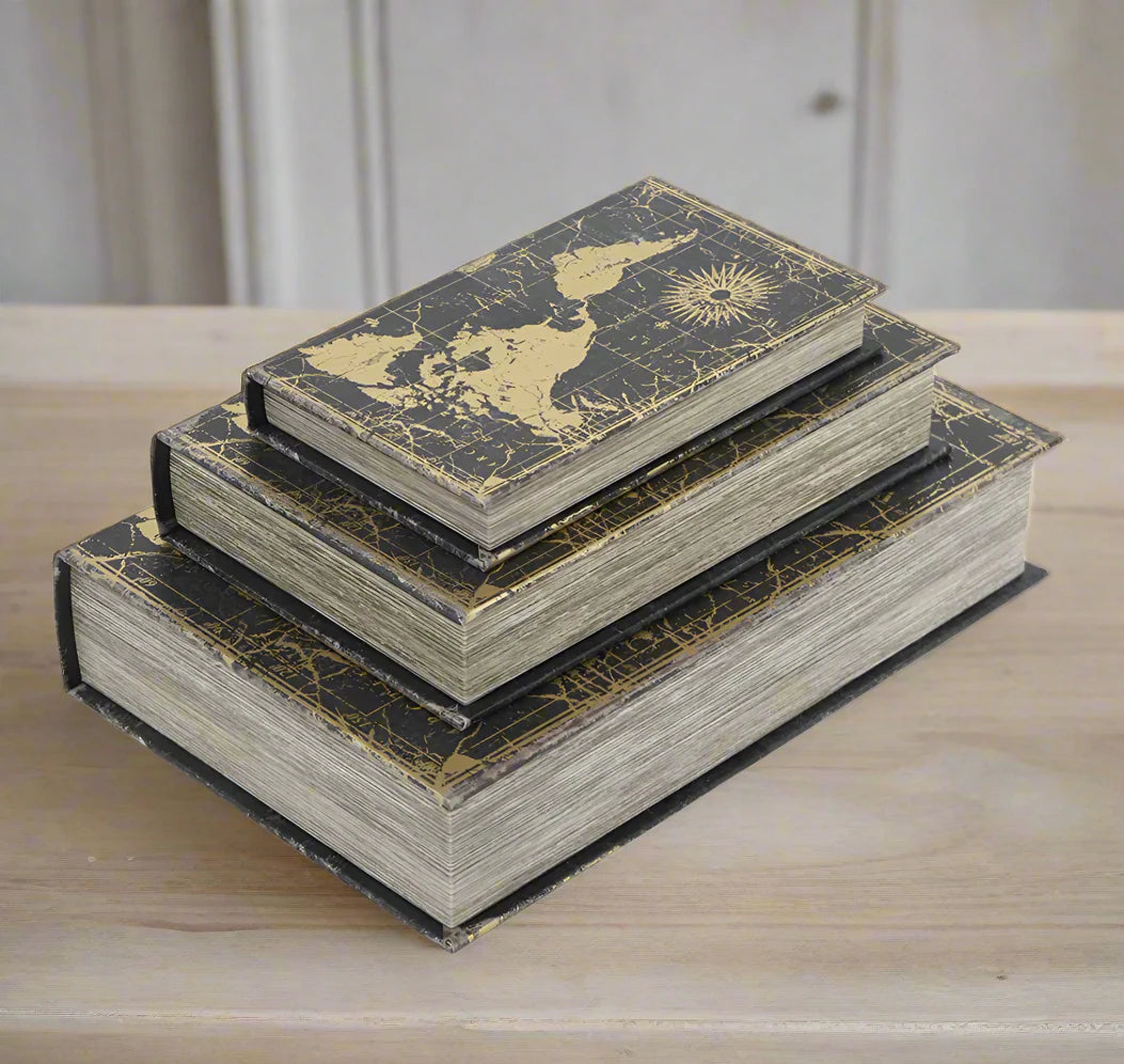Add a luxurious touch to your home decor with our Set of 3 World Map Faux Books. These traditional-inspired pieces elevate any room with their elegance. Spruce up your bookshelf, living room, or entryway with these stylish and practical additions.